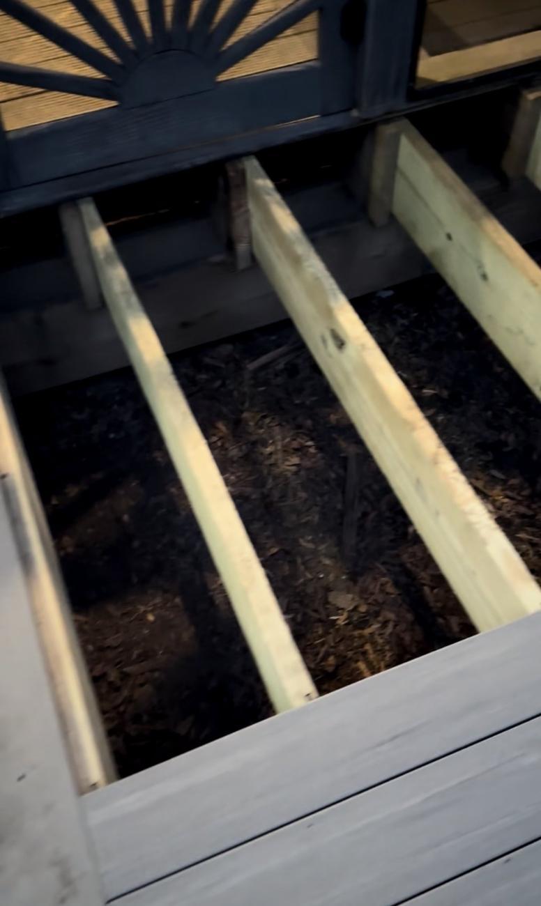 New joists installed under the rebuilt deck