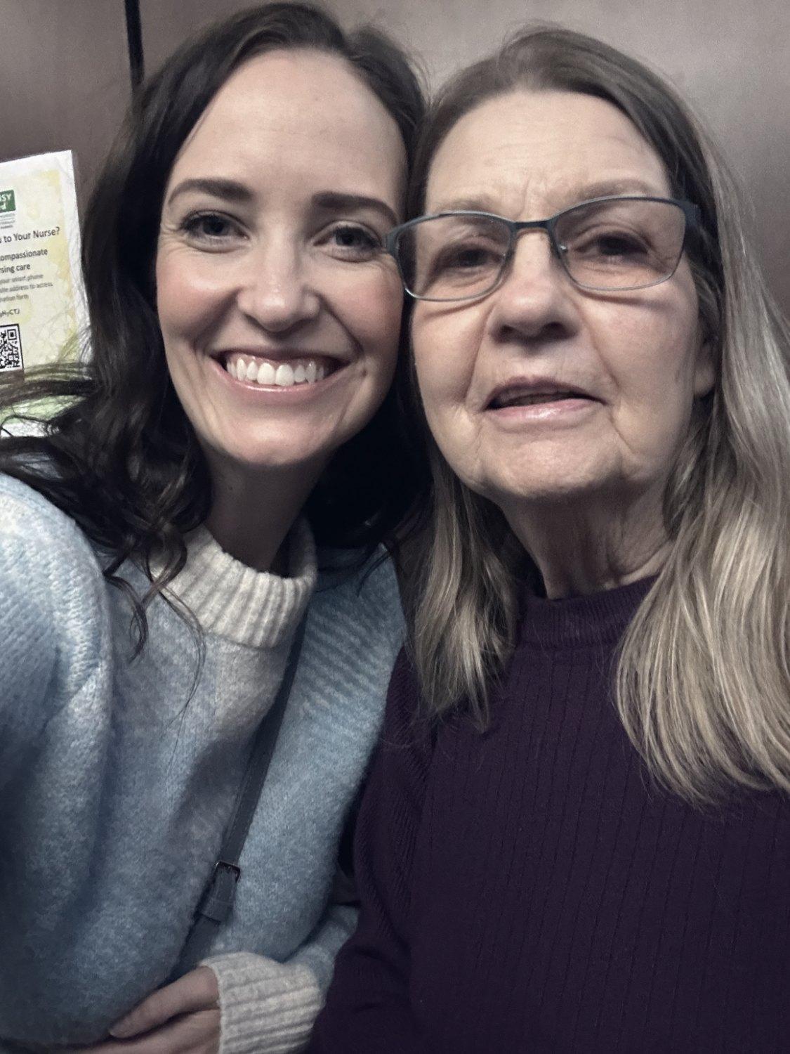 Ashley and her mother together, cheek to cheek
