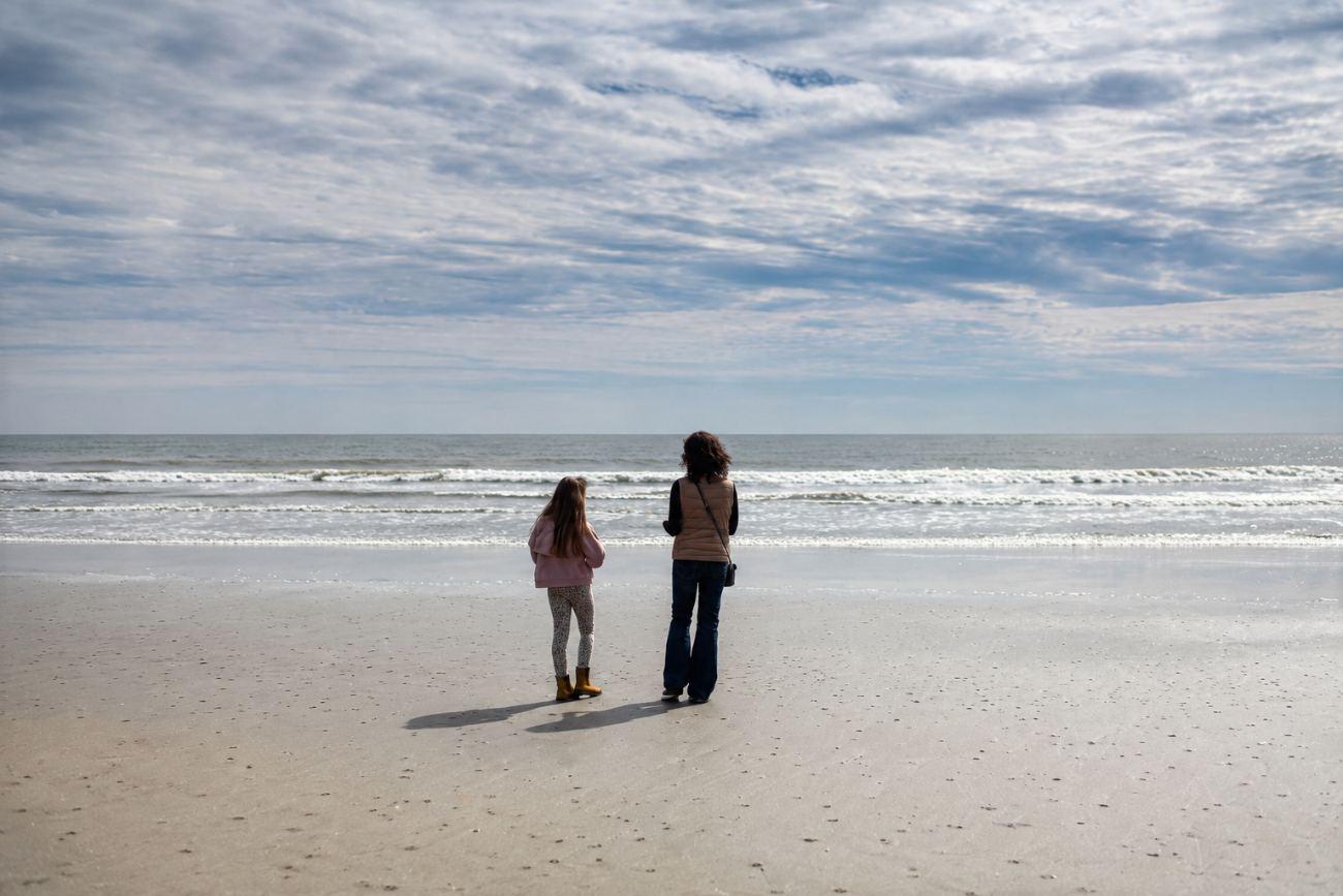 Ashley and her daughter looking out at the water