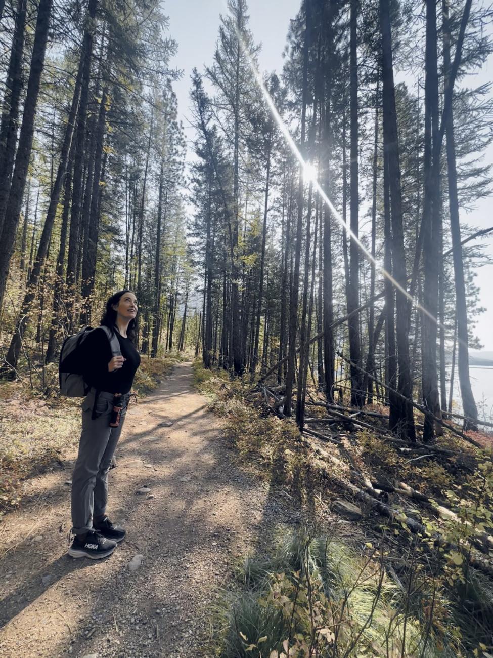 Ashley on a lakeside trail in Montana